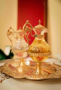 gold and red floral glass vase