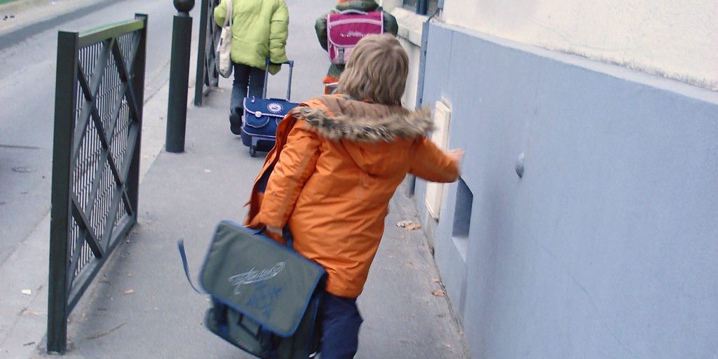 sortie d'ecole hiver : lourd cartable
